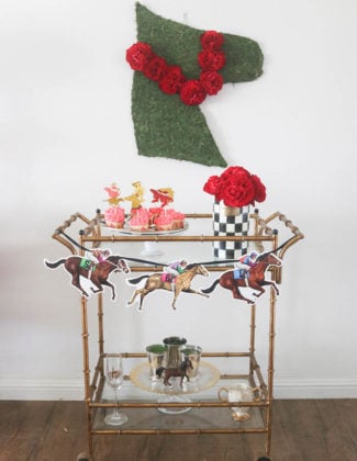 Lifestyle expert and blogger, Candie Anderson has the scoop on trendy and traditional home decor items you need to decorate your gold bar cart for the Kentucky Derby.
