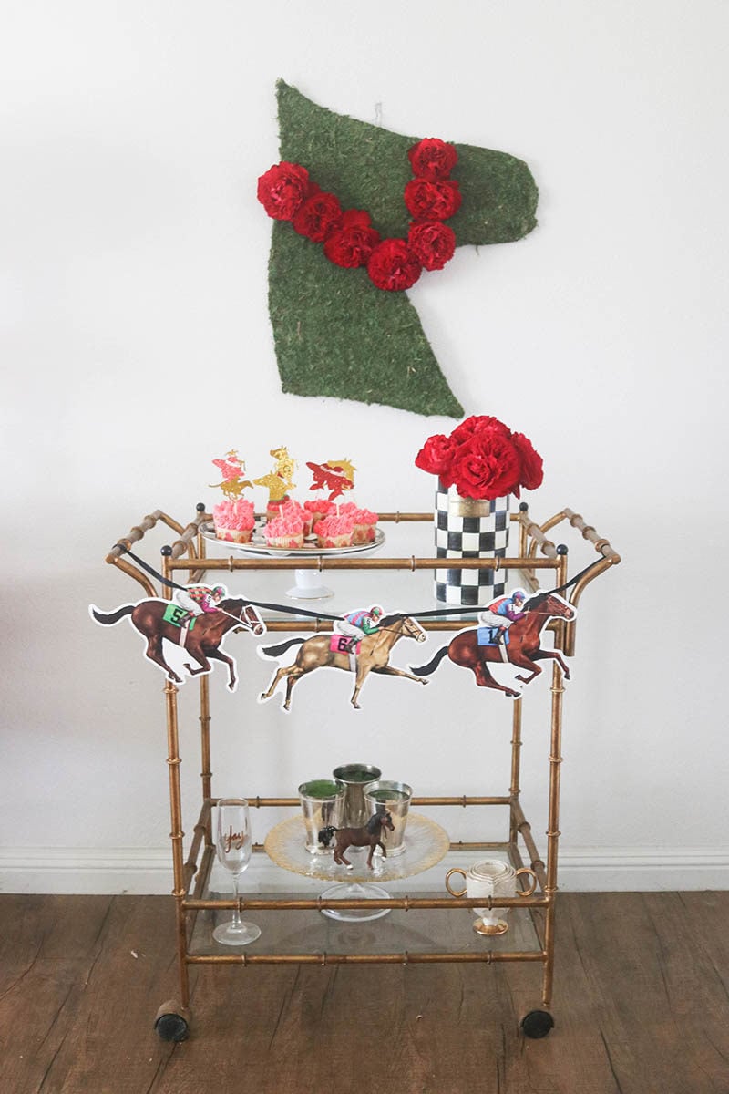 Lifestyle expert and blogger, Candie Anderson has the scoop on trendy and traditional home decor items you need to decorate your gold bar cart for the Kentucky Derby.
