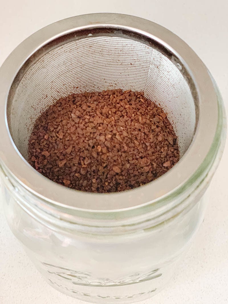 Candie Anderson filled the County Line cold brew coffee brew maker with coarse ground coffee and then added water.