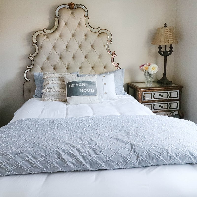 Lifestyle blogger, Candie Anderson of candieanderson.com shares tips on how to create a coastal inspired bedroom on a budget with Walmart.