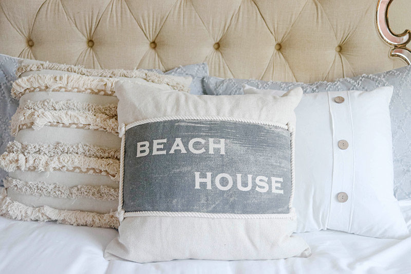 Lifestyle expert, influencer and blogger, Candie Anderson gives you the scoop on how to create a coastal inspired bedroom with trendy pillows including these from Rizzy Home.