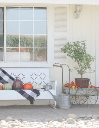 Lifestyle expert and blogger, Candie Anderson has the scoop on how you can decorate your front porch for fall with farmhouse inspired furniture and decor.