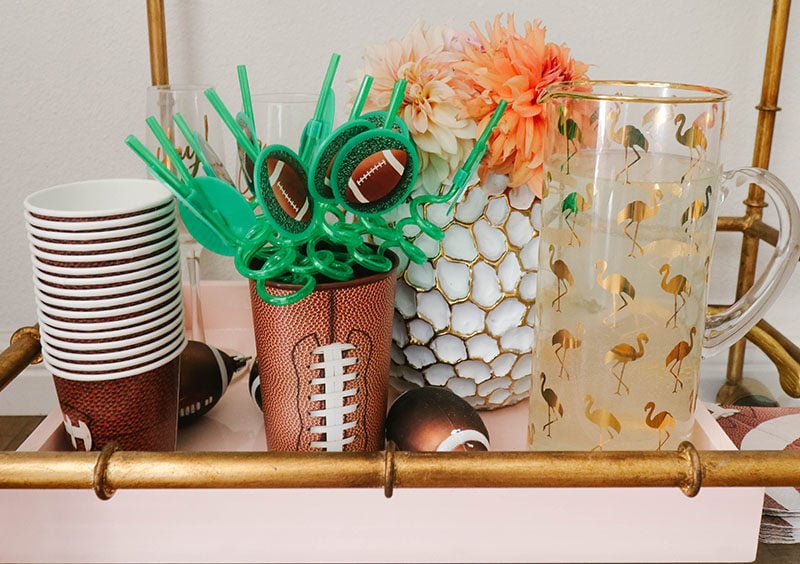 Lifestyle expert, journalist, home decor and sports fan Candie Anderson has the scoop on how she created her blush pink and gold football dessert cart to kick off the NFL season. This cart will be perfect the entire season! You'll love it for the playoffs, NCAA football, and the NFL Super Bowl. Season 100 is going to be amazing!