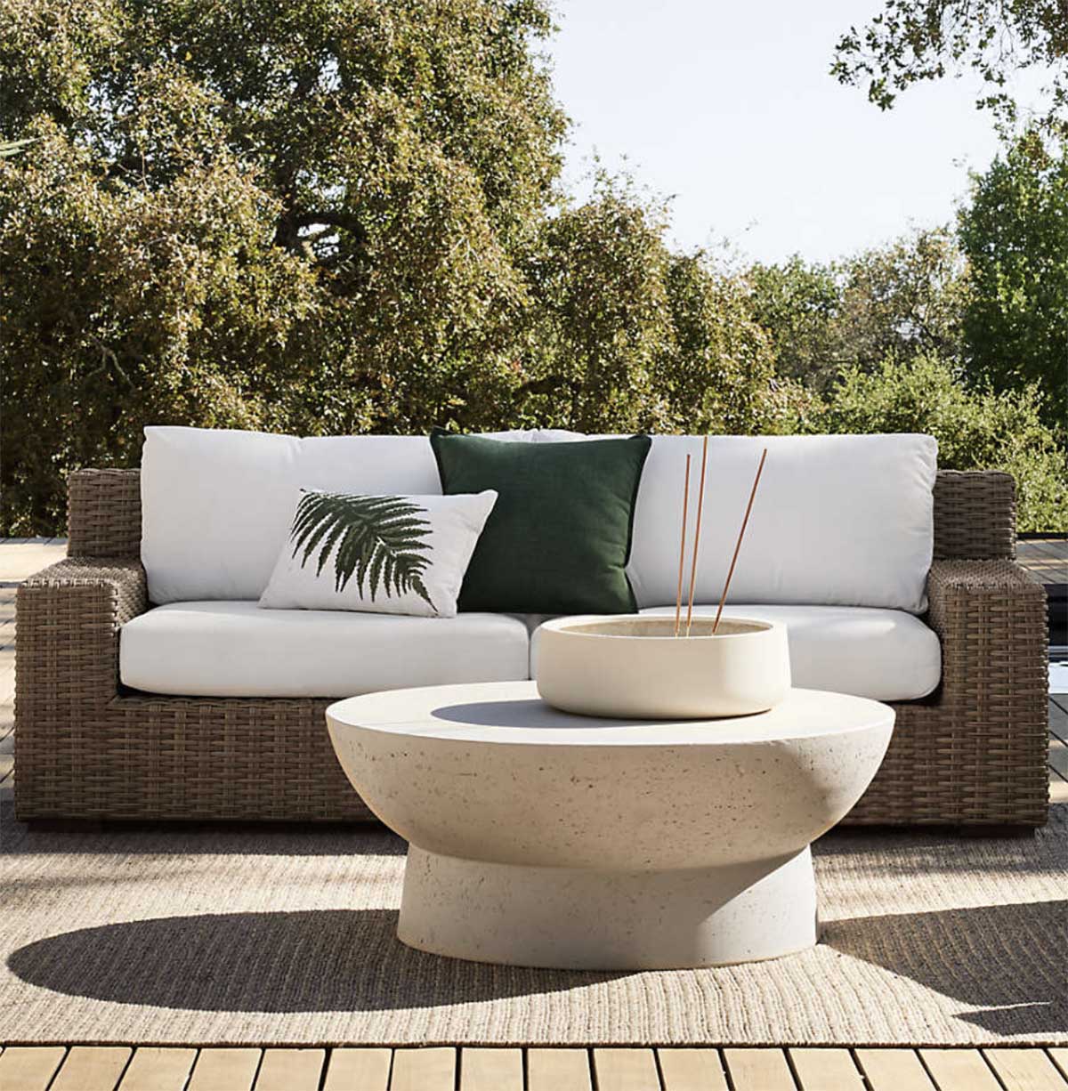 Crate and Barrel Abaco 83" Resin Wicker Outdoor Sofa with Canvas Natural Sunbrella ® Cushions best outdoor wicker sofas