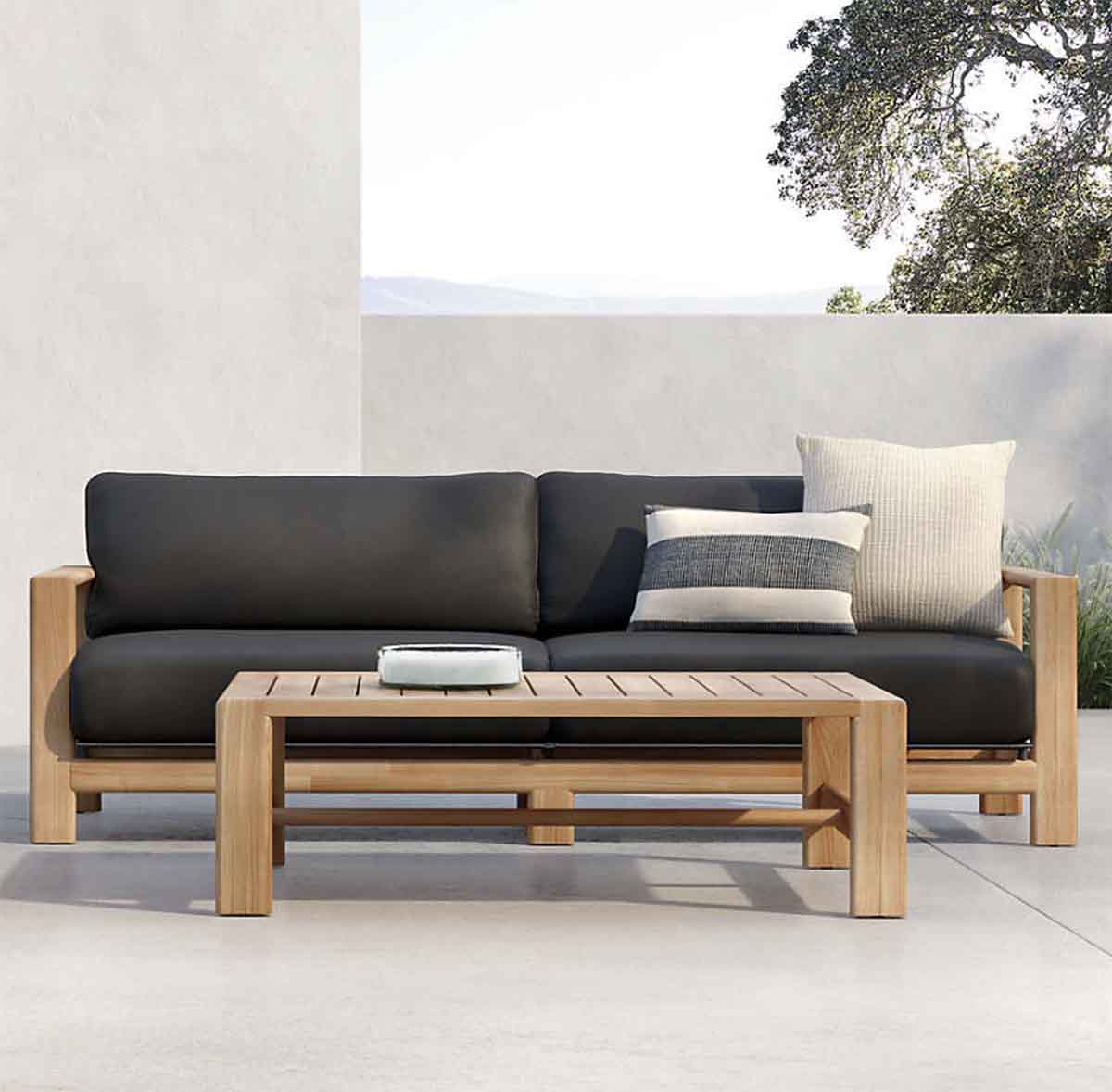 Crate and Barrel Anguilla 90" Teak Outdoor Sofa with Black Cushions best outdoor teak sofas