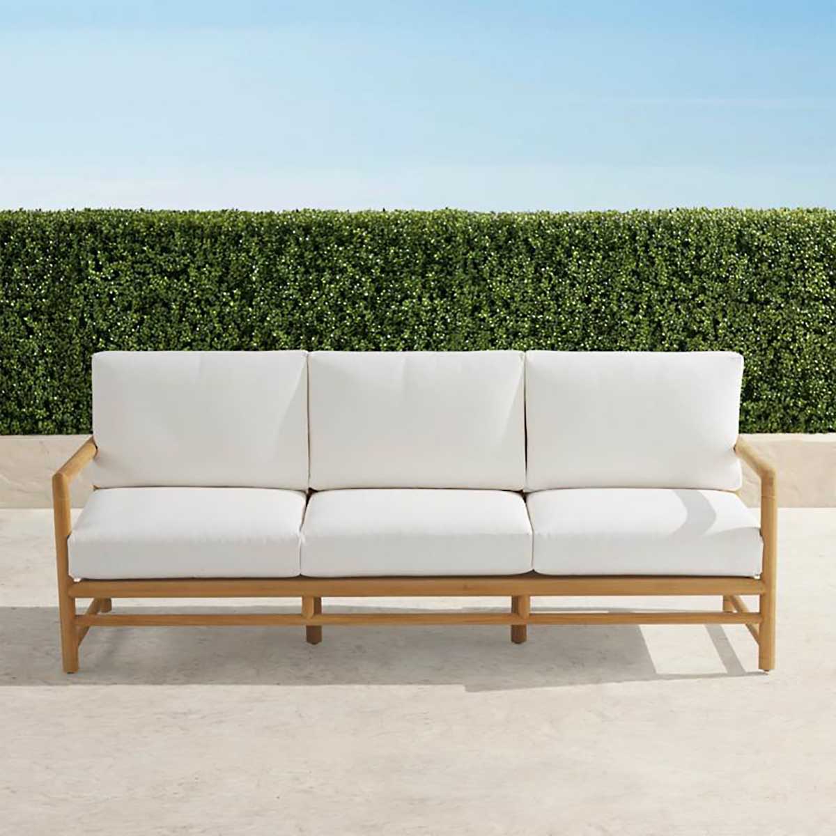 Frontgate Ferrara Sofa with Cushions In Natural Teak best outdoor teak sofas