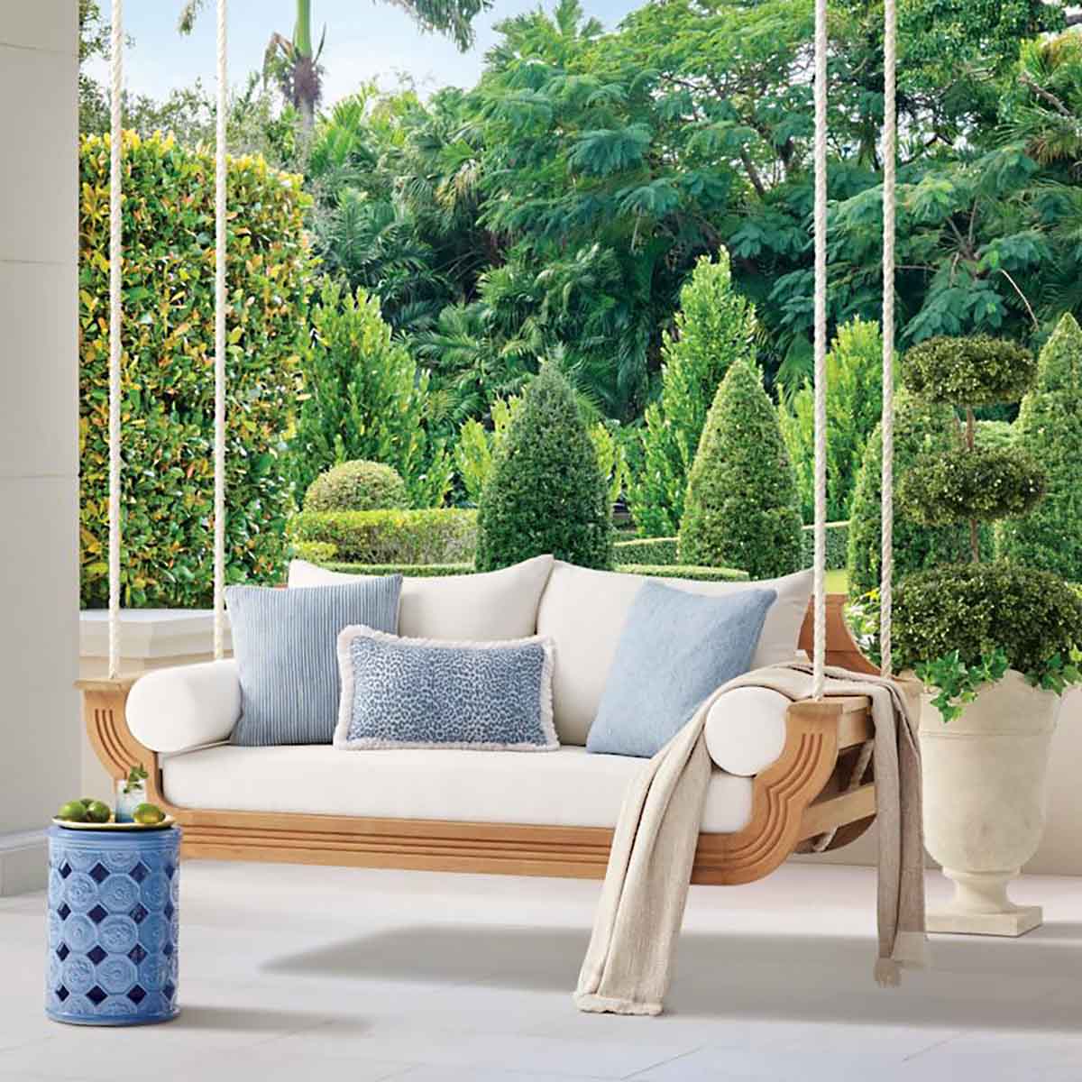 Frontgate Trevose Hanging Daybed with Cushions in Natural Teak best porch swings outdoor patio