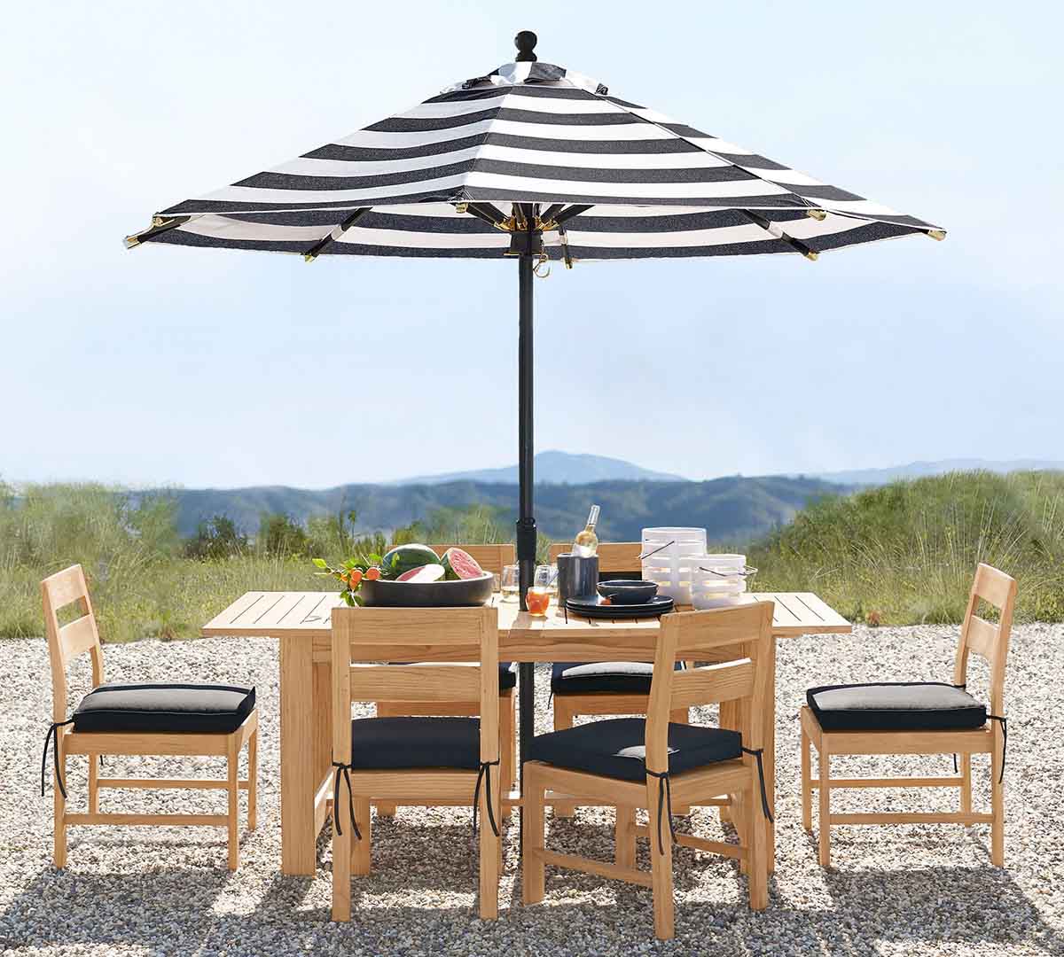 Pottery Barn Malibu Teak Rectangular Extendable Outdoor Dining Table (75"-105") best teak outdoor dining tables