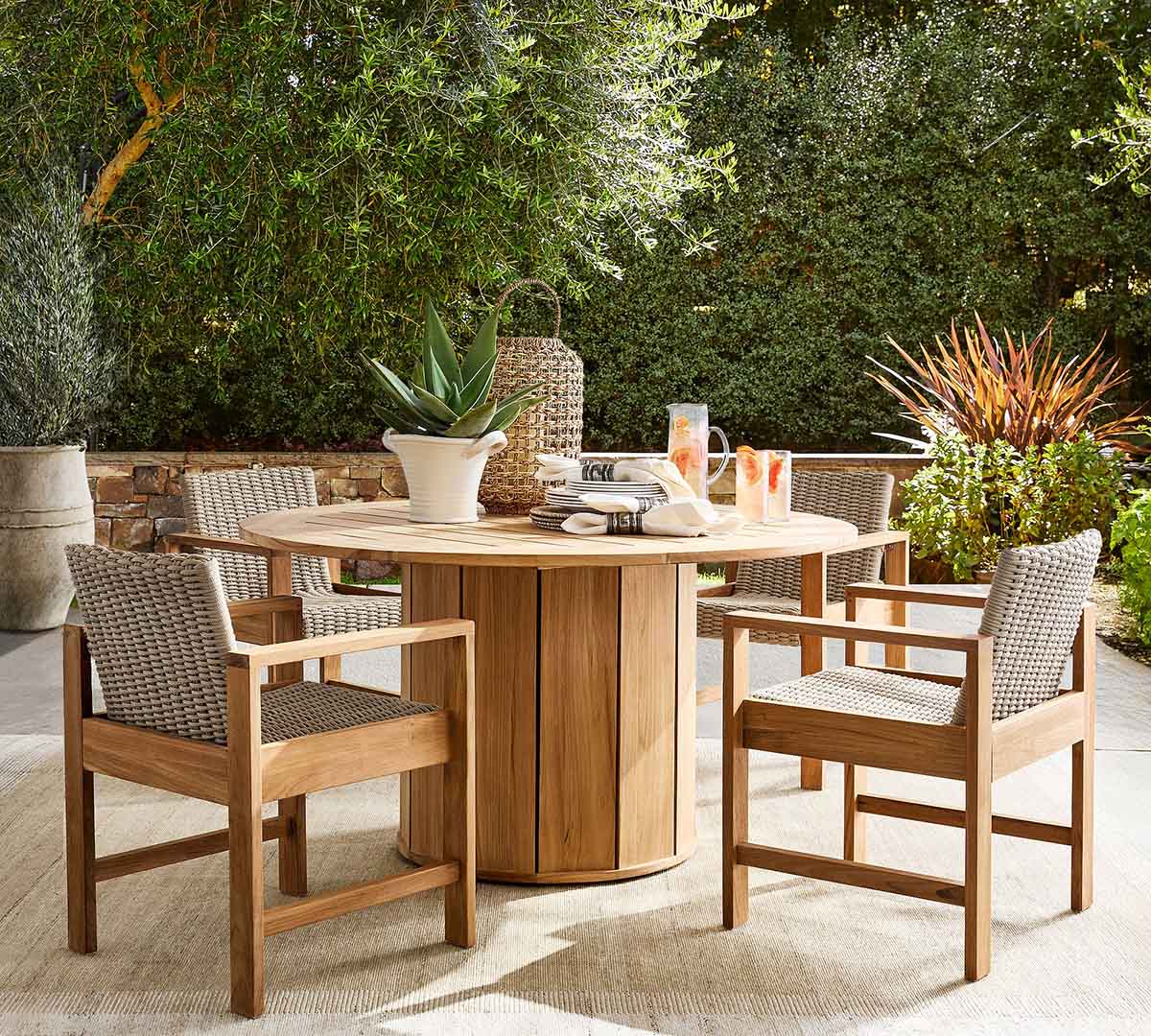 Pottery Barn Malibu Teak Round Outdoor Grand Dining Table (56") best teak outdoor dining tables