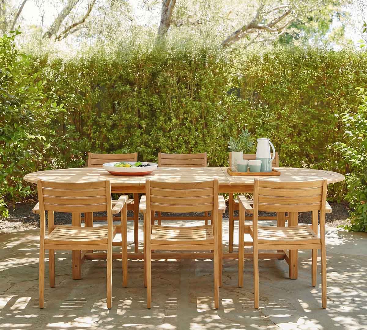 Pottery Barn Nassau Teak Oval Extendable Outdoor Dining Table (59"-118") best teak outdoor dining tables