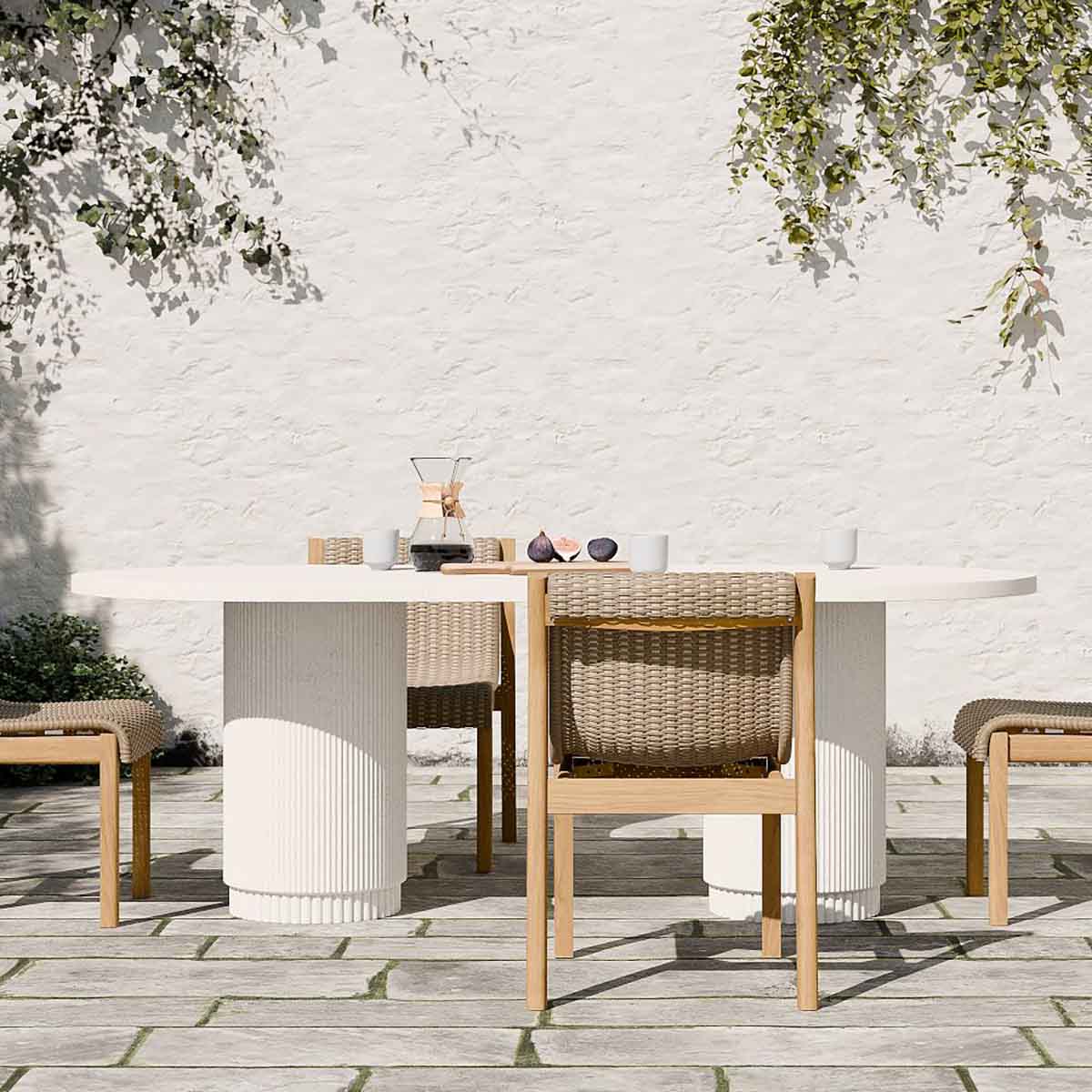 West Elm Fluted Outdoor Oval Concrete Dining Table (84") best white outdoor dining tables