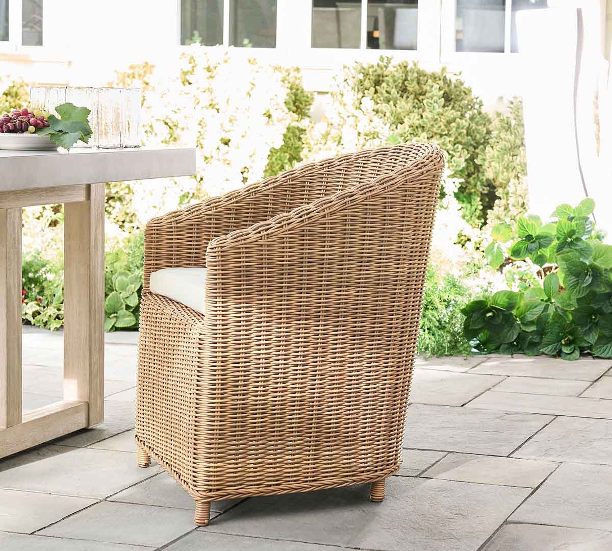 Huntington Wicker Slope-Arm Outdoor Dining Chair Natural best outdoor wicker dining chairs