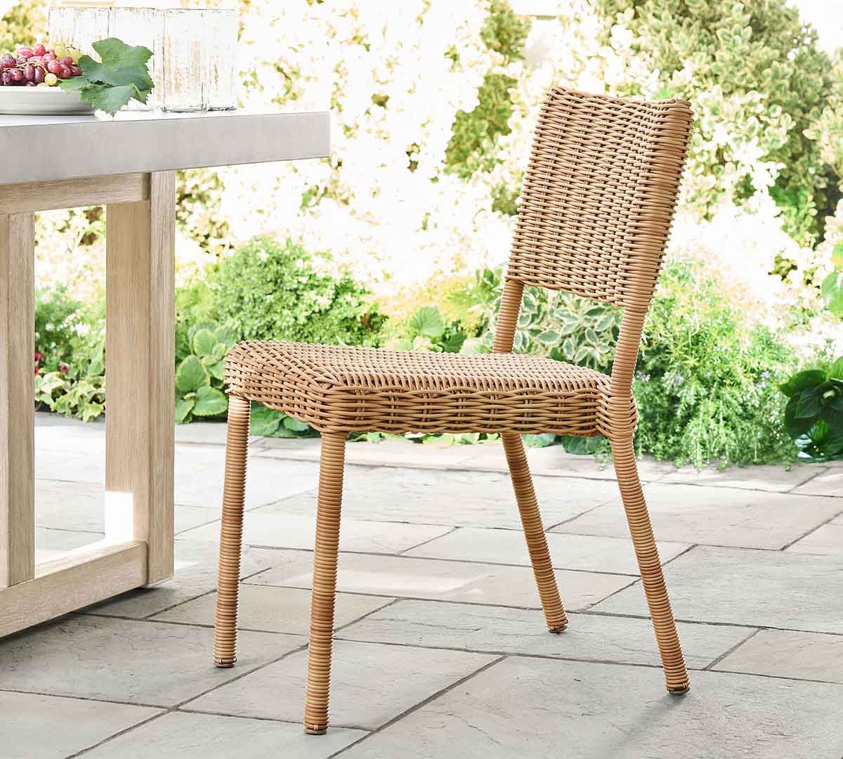Potterty Barn Huntington Wicker Stacking Outdoor Dining Chair Natural best outdoor wicker dining chairs
