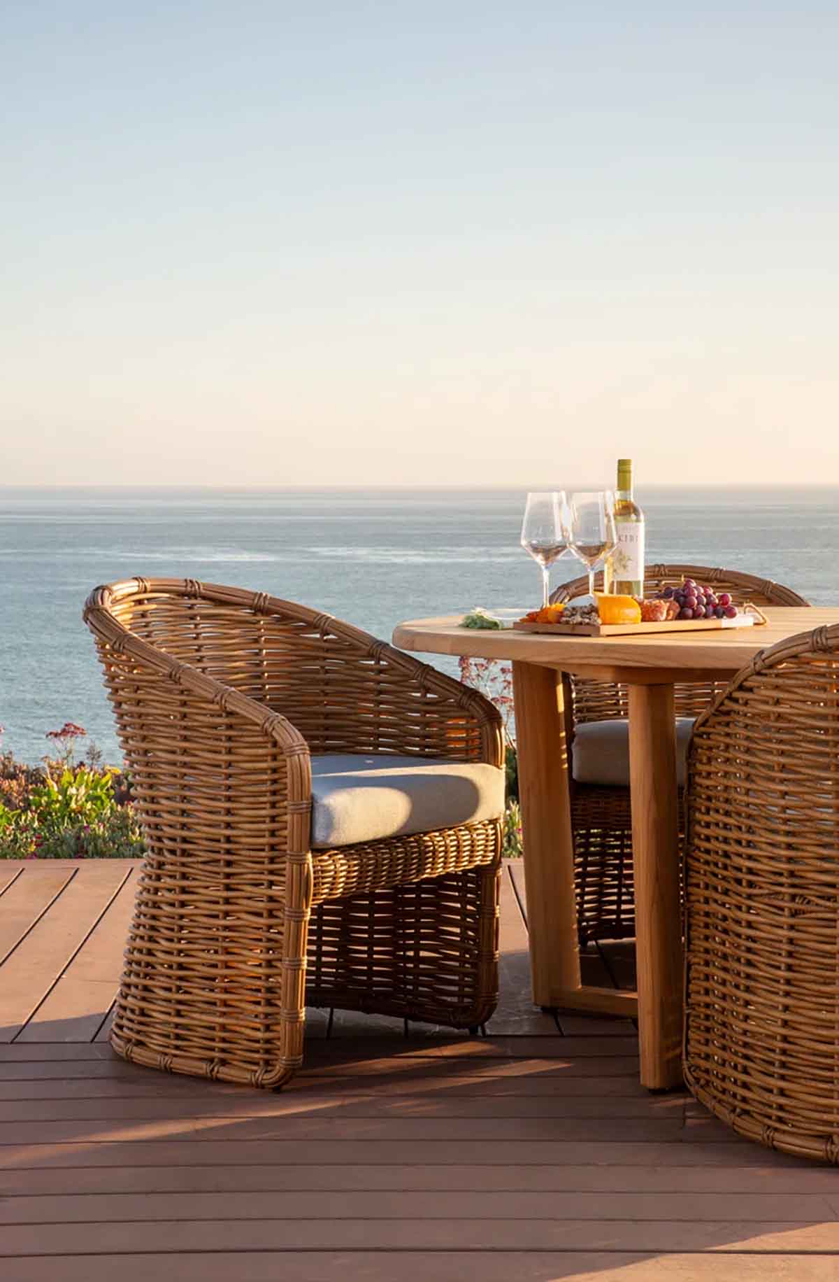 Sunset West Playa Wicker Premium All-Weather Wicker Outdoor Dining Armchair with Sunbrella® Cushion best outdoor wicker dining chairs