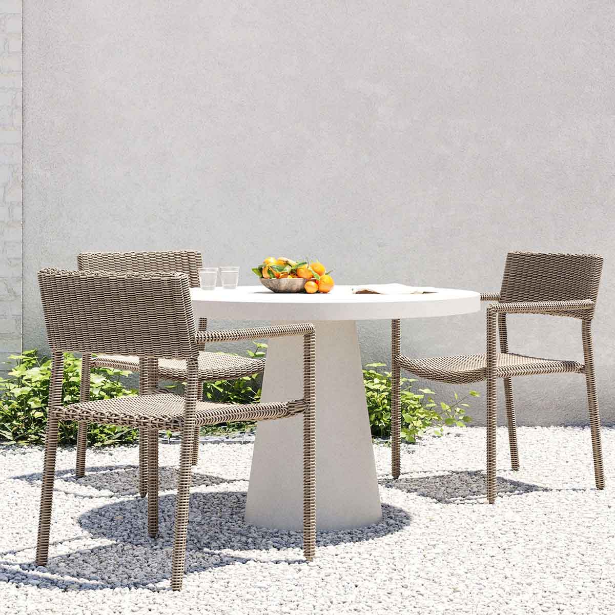 West Elm Westport Wicker Slim Profile Outdoor Stacking Dining Arm Chair (Set of 2) Seashore best outdoor wicker dining chairs