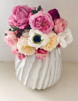Lifestyle expert, journalist and interior design blogger Candie Anderson of candieanderson.com shares her favorite white ceramic vases including this beautiful large Mooney vase filled with garden roses and anemones.