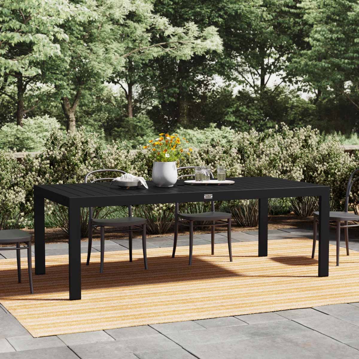 Wade Logan Braxdyn Rectangular Outdoor Dining Table Black outdoor metal dining tables best