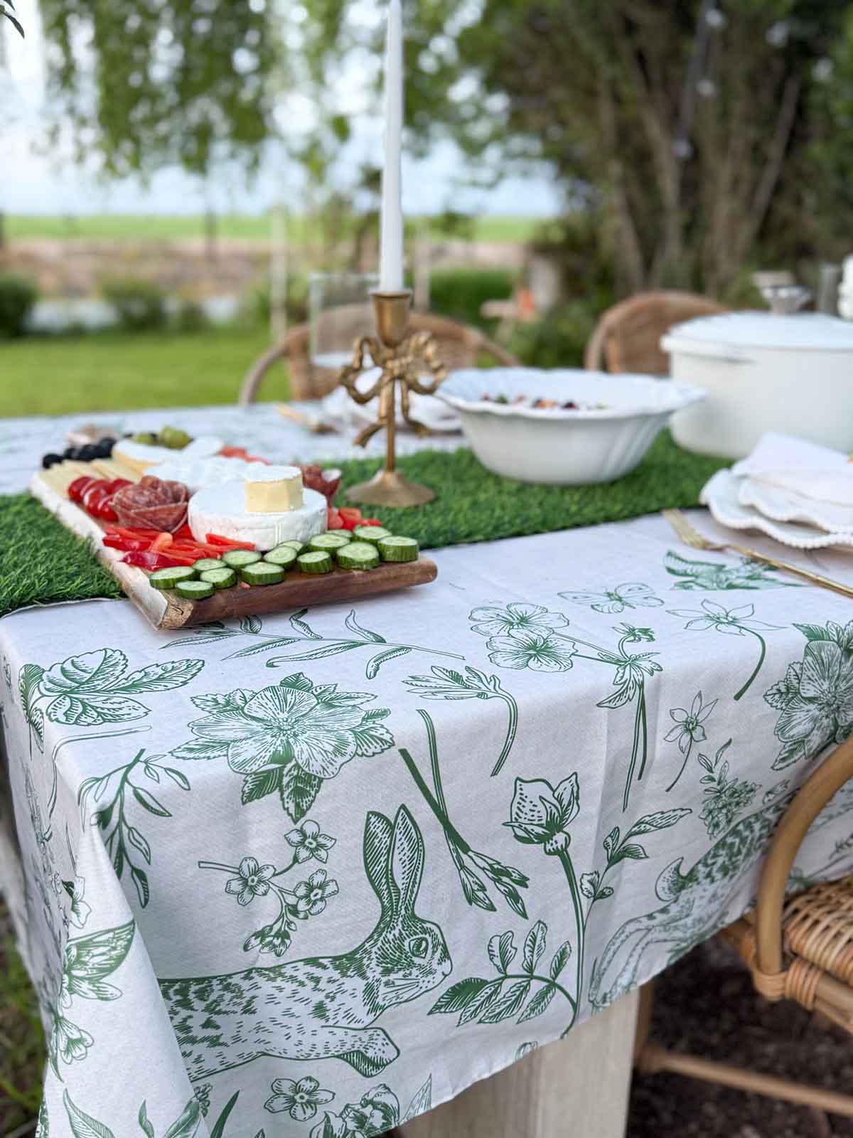 Entertaining expert, Candie Anderson of candieanderson.com shows you how to create a beautiful woodland inspired Easter tablescape with the Horaldaily Neutral Tablecloth with Green Bunnies. It's also available in green with beige bunnies.