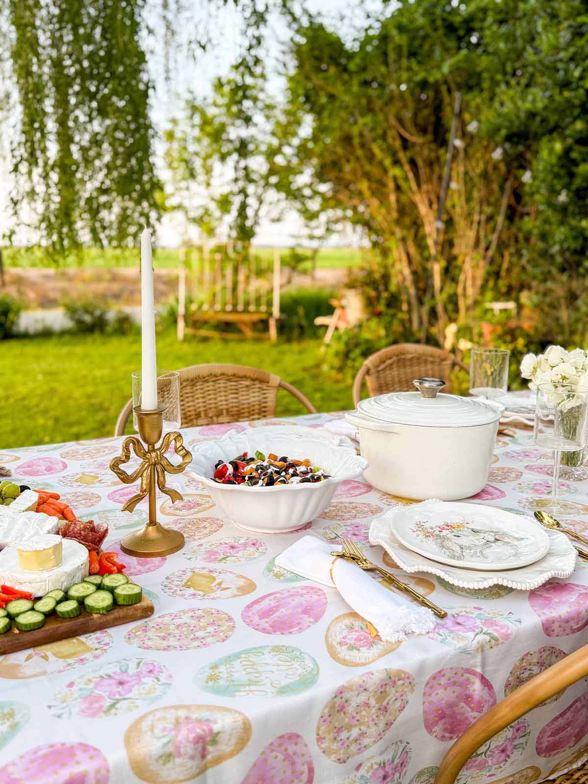 Entertaining expert, journalist and lifestyle blogger Candie Anderson of candieanderson.com shares how she created her beautiful Easter tablescape with her Newbridge Easter Egg Delight Fabric Tablecloth.