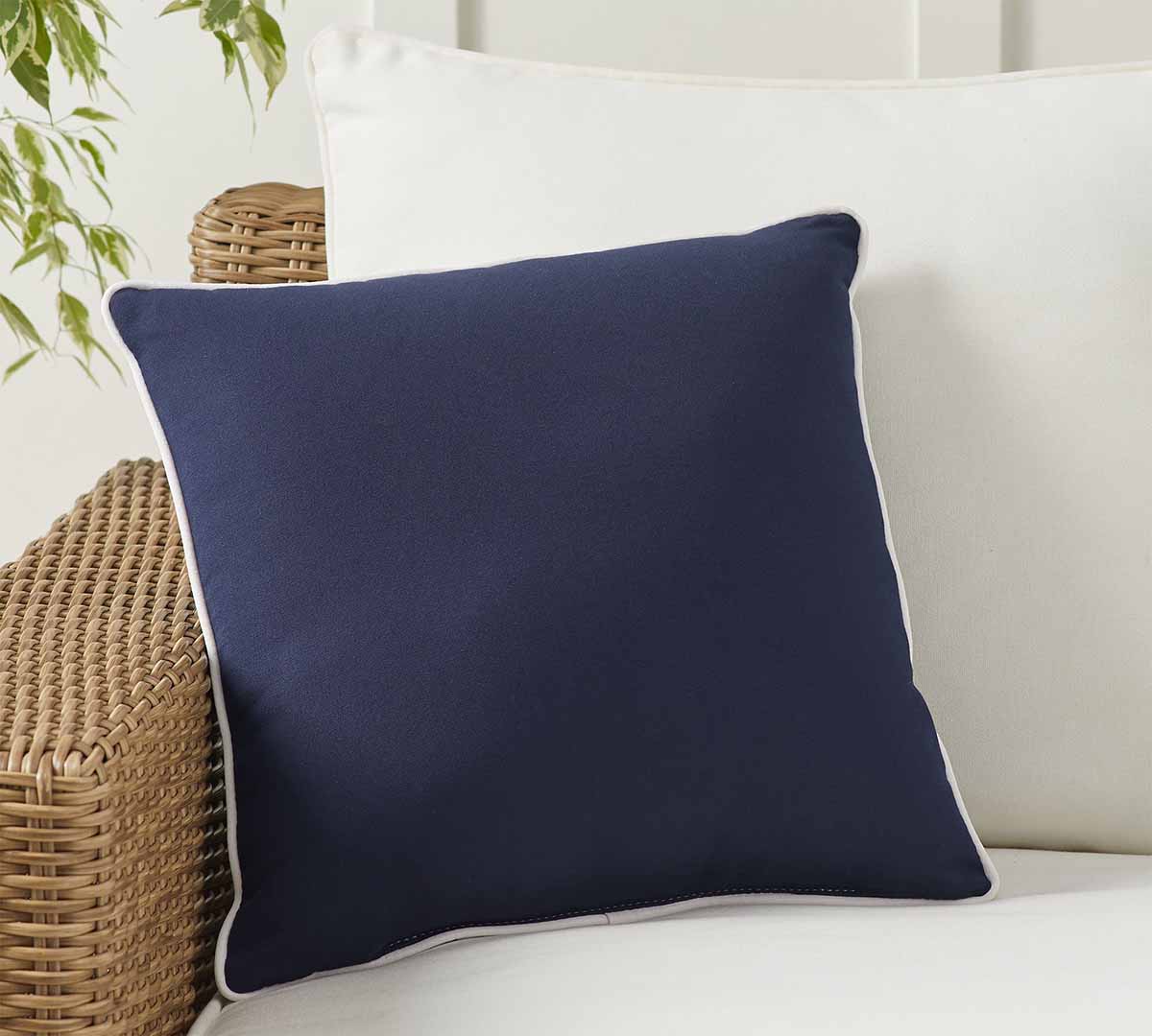 Pottery Barn Sunbrella® Contrast Piped Solid Outdoor Pillow best blue outdoor throw pillows