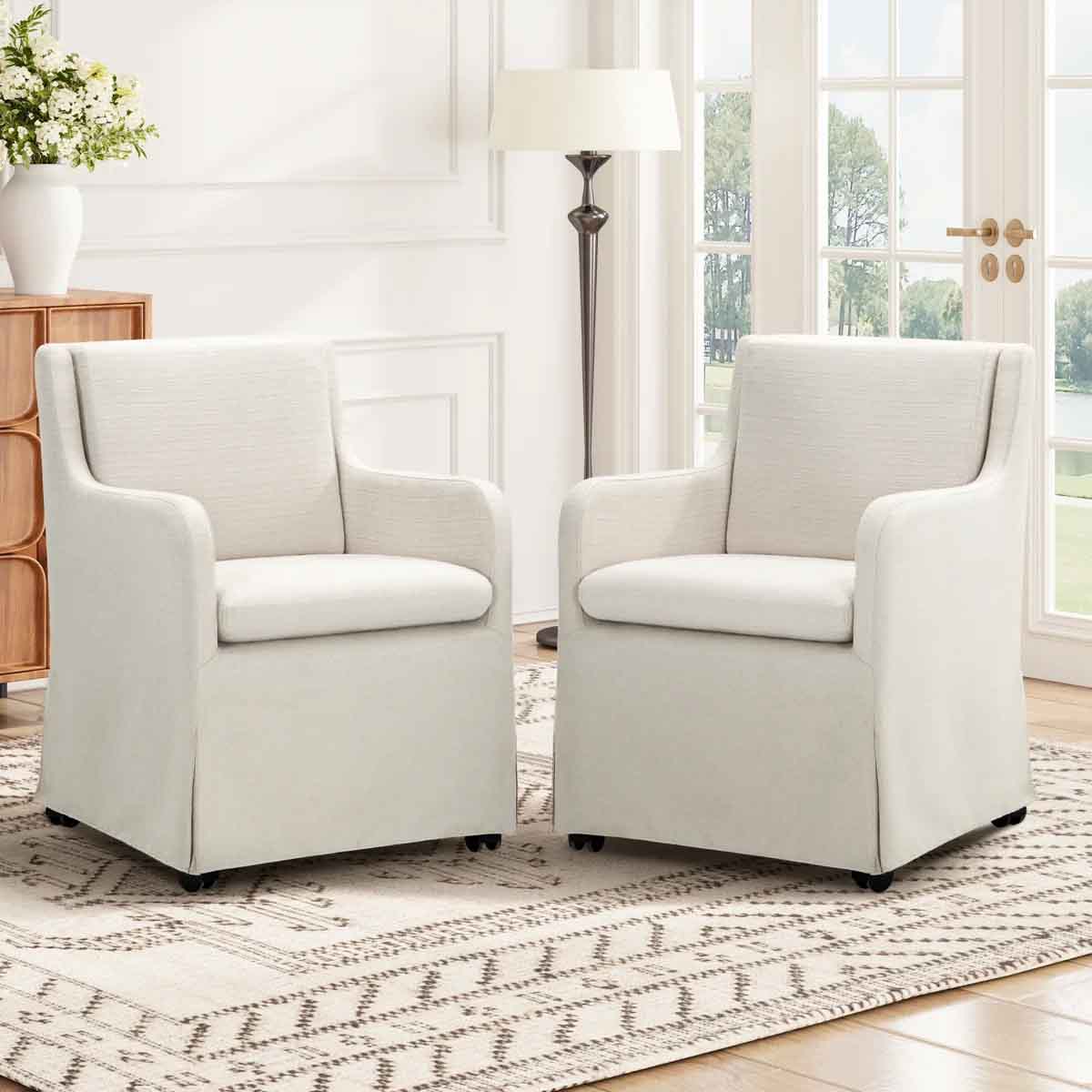 Lark Manor Upholstered Dining Armchairs with Casters best slipcovered dining chairs
