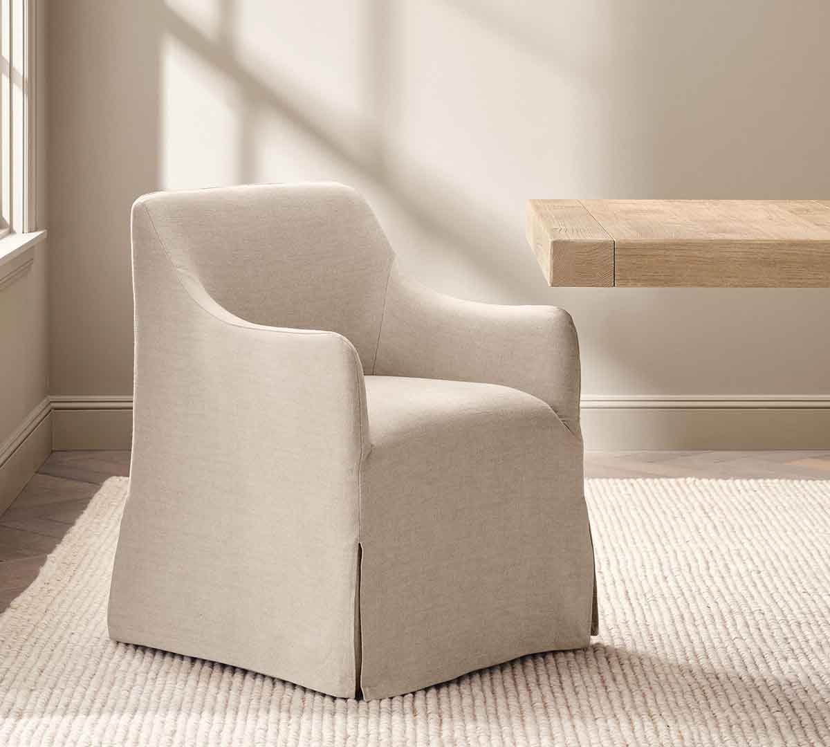 Pottery Barn Maxine Slope Slipcovered Dining Armchair best slipcovered dining chairs