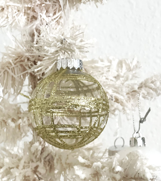 Lifestyle expert, journalist and interior design blogger Candie Anderson of candieanderson.com has the scoop on the top holiday entertaining essentials under $50 including these gold Sea Team 60mm/2.36” Christmas ornaments! They're perfect for your Christmas tree, mantel, and dining table.