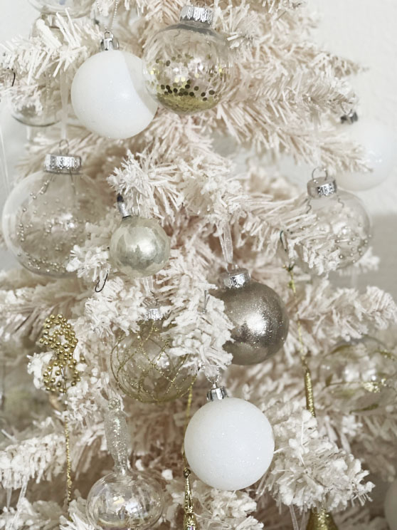 Lifestyle expert, journalist and interior design blogger Candie Anderson of candieanderson shares her favorite round Sea Team 80mm Shatterproof Christmas Ornaments in clear with gold glitter, beads, sequins and more!
