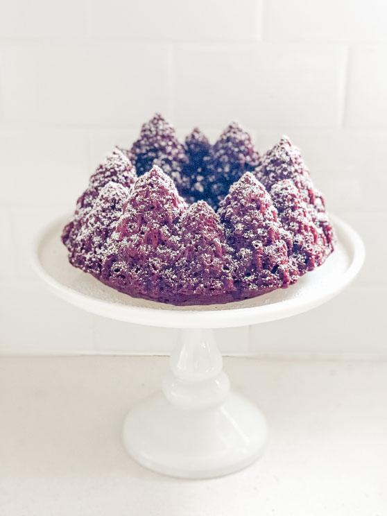 Lifestyle expert, journalist and entertaining blogger Candie Anderson of candieanderson.com shares her delicious red velvet Christmas tree cake (sprinkled with powdered sugar)! She made it using the Nordic Ware Pine Forest Bundt Cake pan.