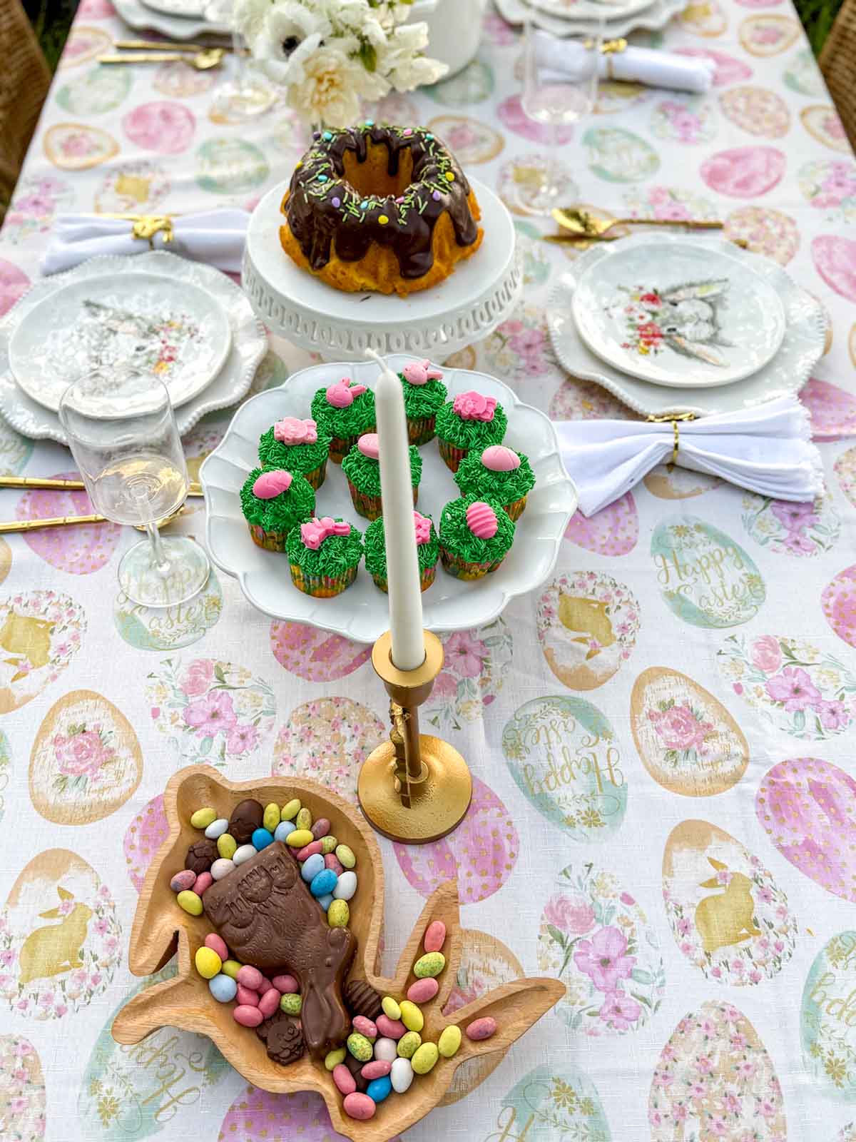 Entertaining expert, journalist and lifestyle blogger Candie Anderson of candieanderson.com added beautiful modern minimalistic wine glasses to her whimsical Easter tablescape.