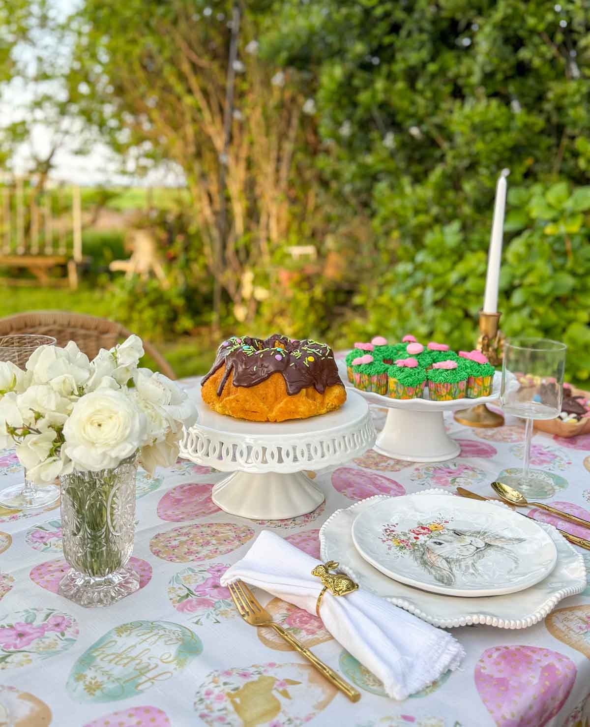 Entertaining expert, journalist and entertaining blogger Candie Anderson of candieanderson.com shares two gorgeous Easter tablescapes including her beautiful whimsical Easter tablescape!