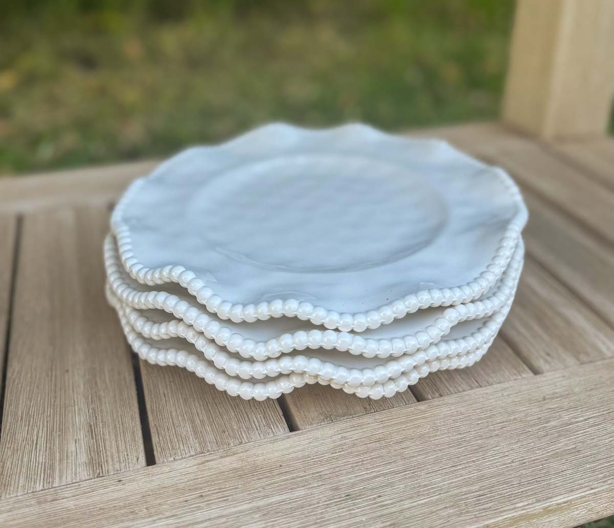 Entertaining expert, Candie Anderson shares her Certified International Perlette salad plates on her console table.