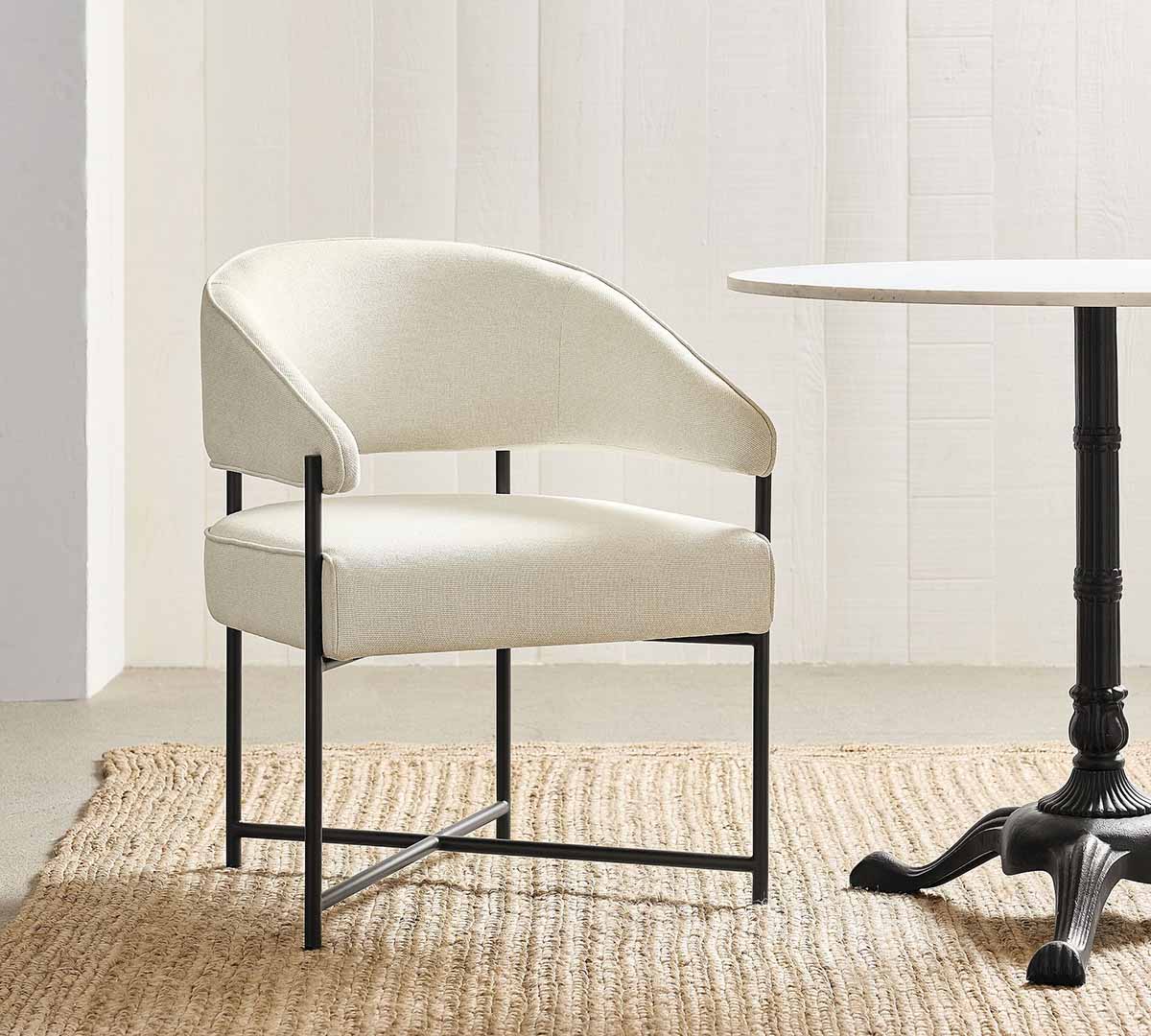 Pottery Barn Baldwin Upholstered Metal Dining Chair Performance Heathered Basketweave Alabaster White barrel dining chairs best
