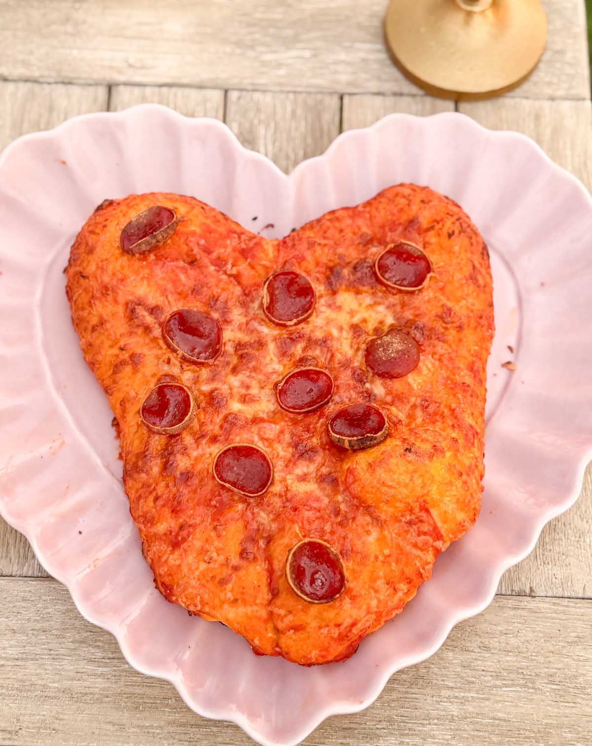 My mom and I tried to make a heart shaped pizza for Valentine's Day, this was the end result! Thankfully I have a heart shaped platter!