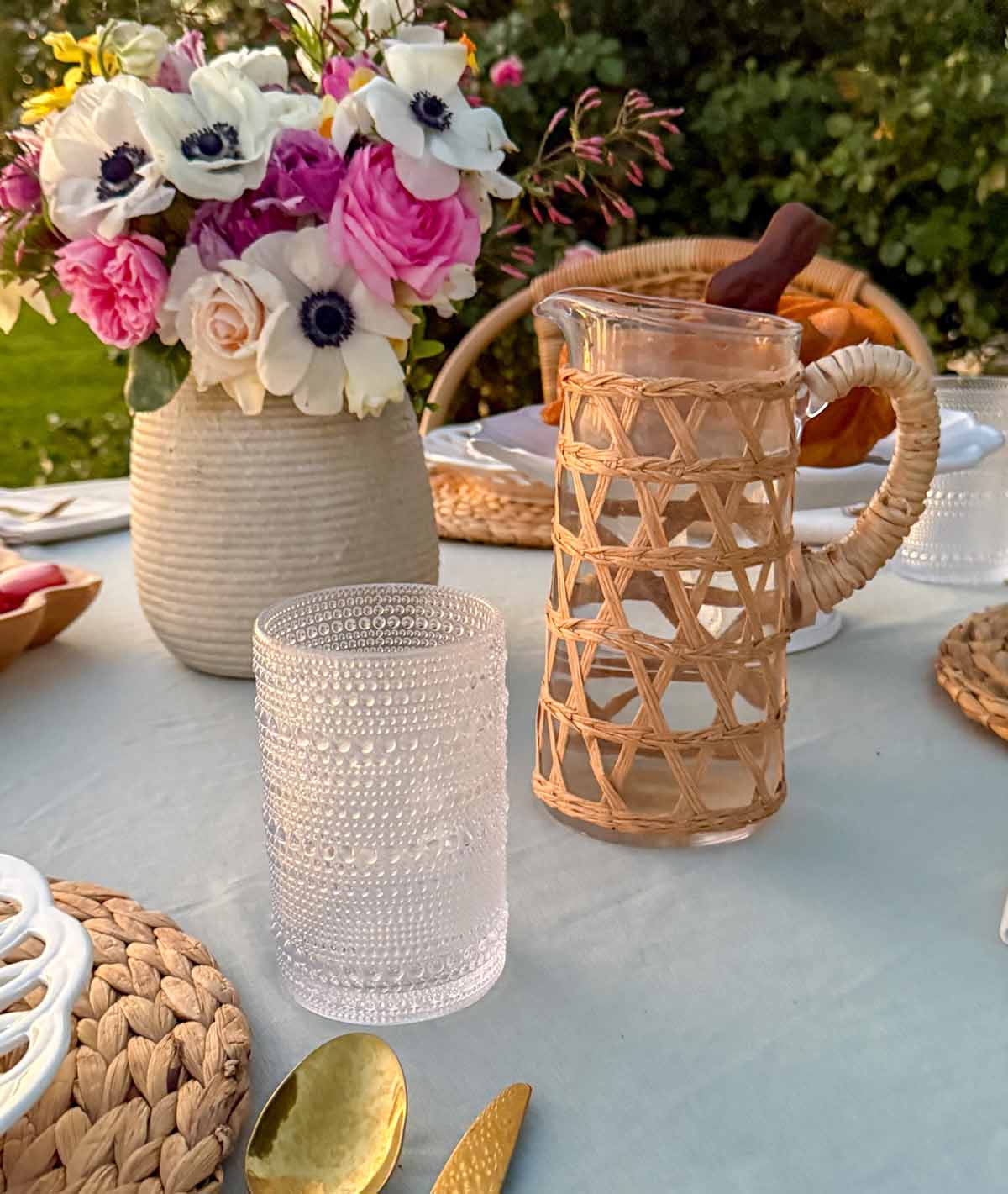 Entertaining expert, journalist and lifestyle blogger Candie Anderson of candieanderson.com shares how she adorned her spring tablescape with Fortessa Jupiter drinking glasses and a woven glass pitcher! 