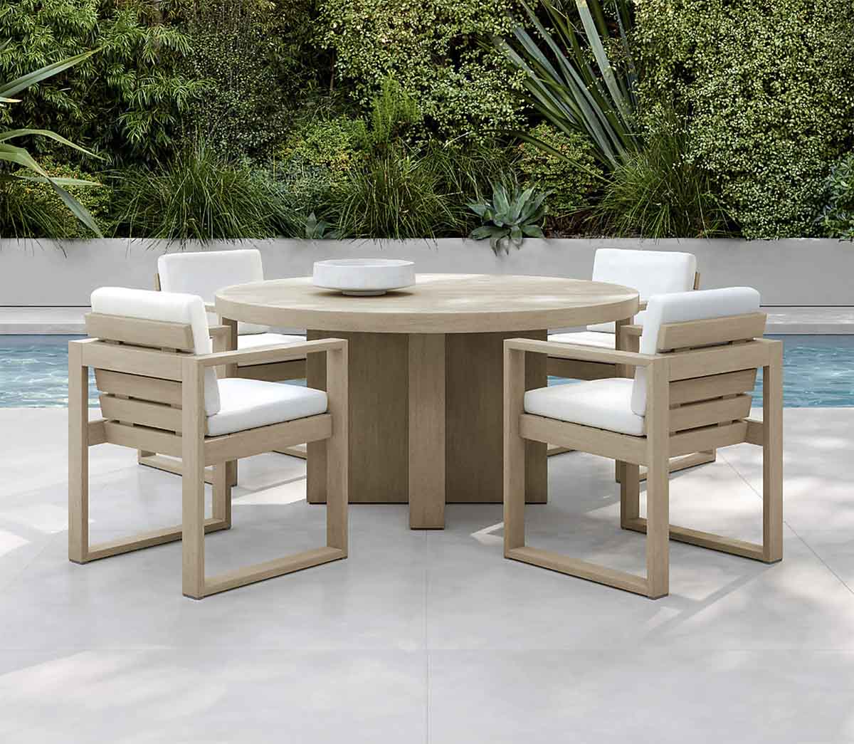 Crate and Barrel Mallorca 60" Round Wood Outdoor Dining Table best round outdoor dining tables
