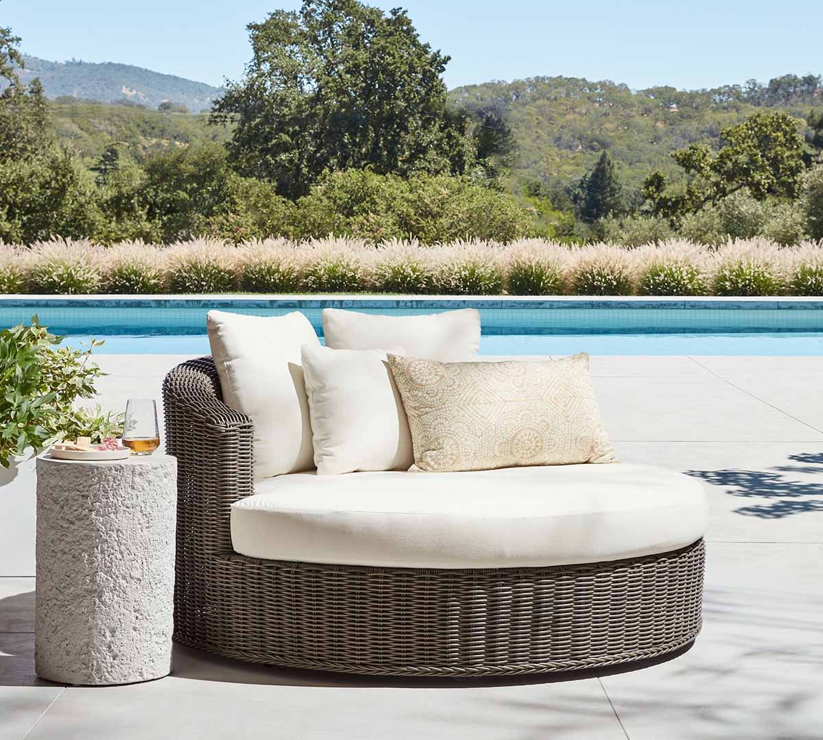 Pottery Barn Huntington Wicker Round Swivel Outdoor Daybed Gray best wicker outdoor daybeds