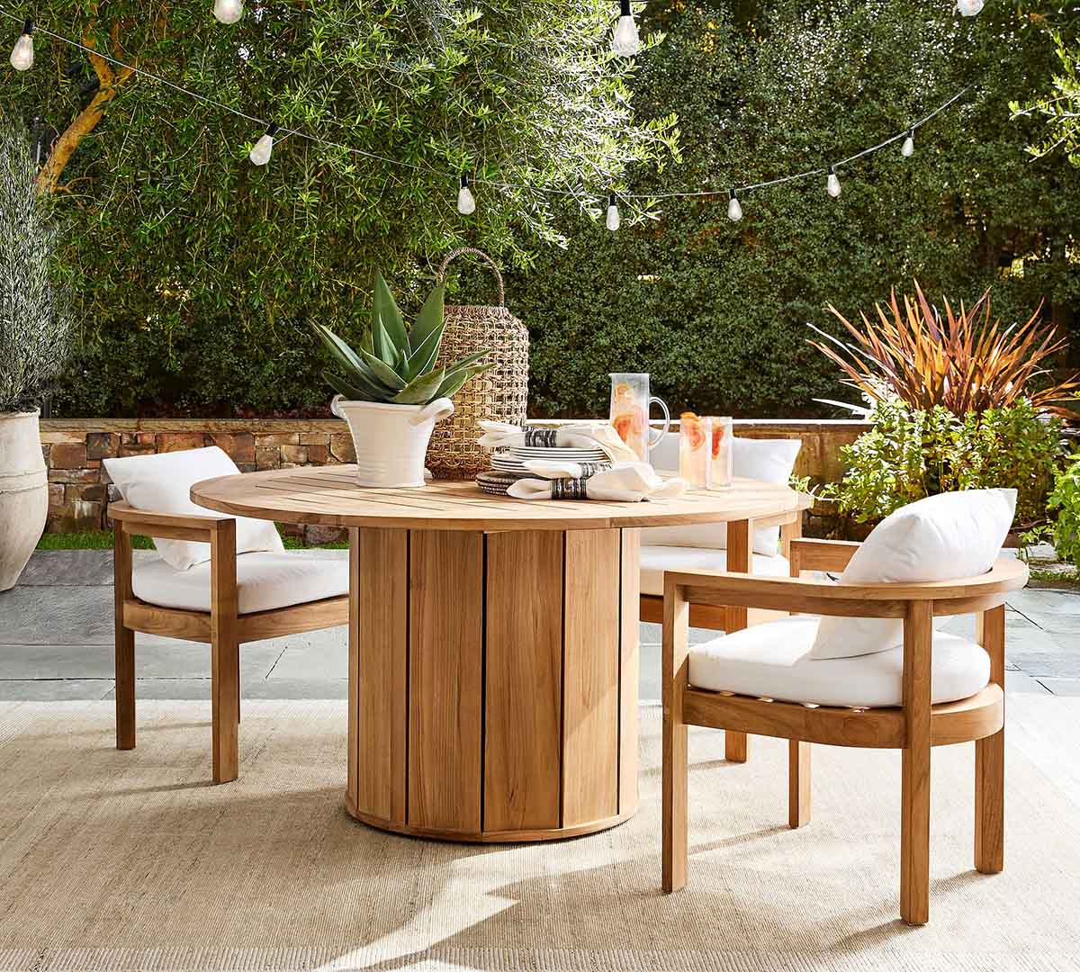 Pottery Barn Malibu Teak Round Outdoor Grand Dining Table (56") best round outdoor dining tables