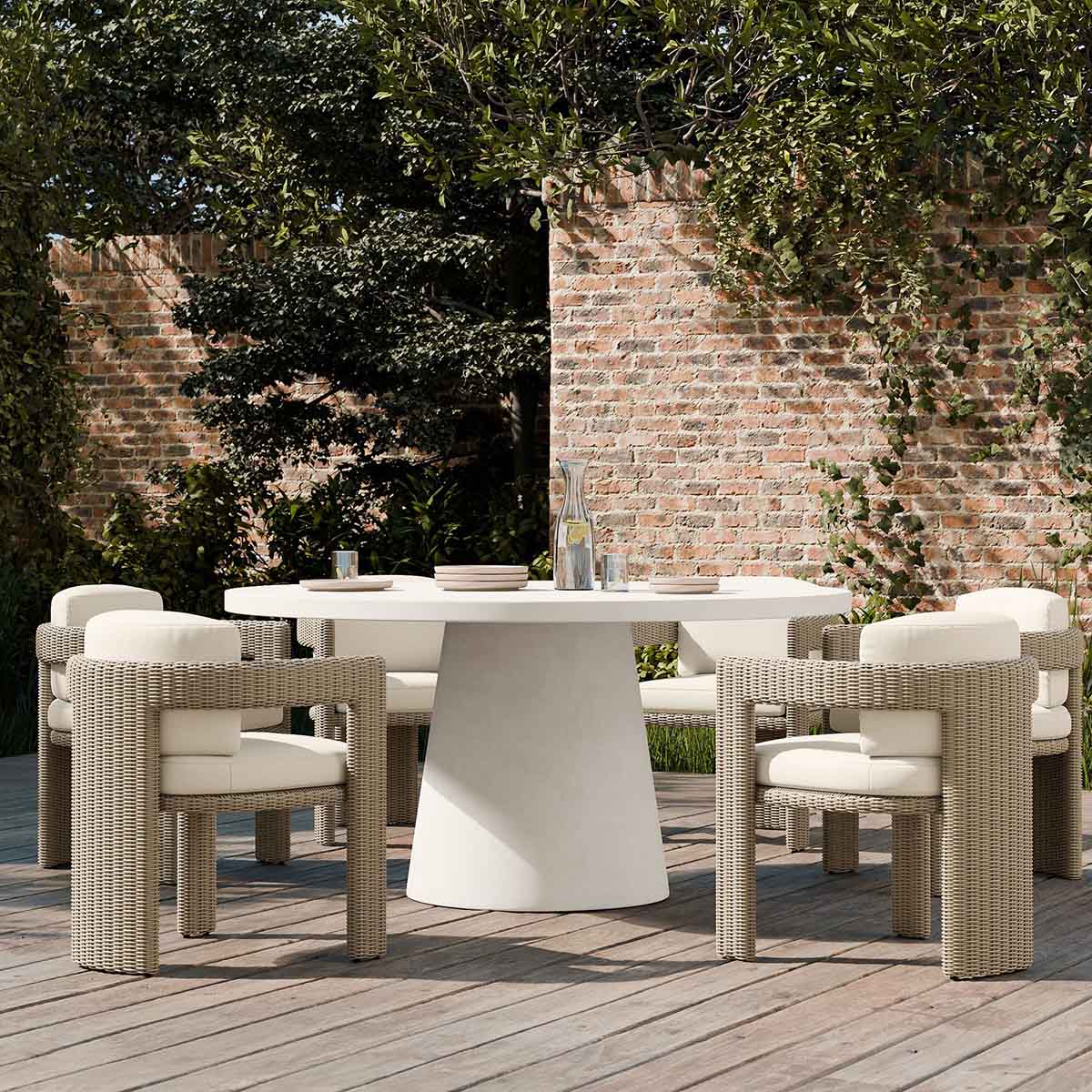 West Elm Concrete Indoor/Outdoor Pedestal Round Dining Table (32"–60") best round outdoor dining tables