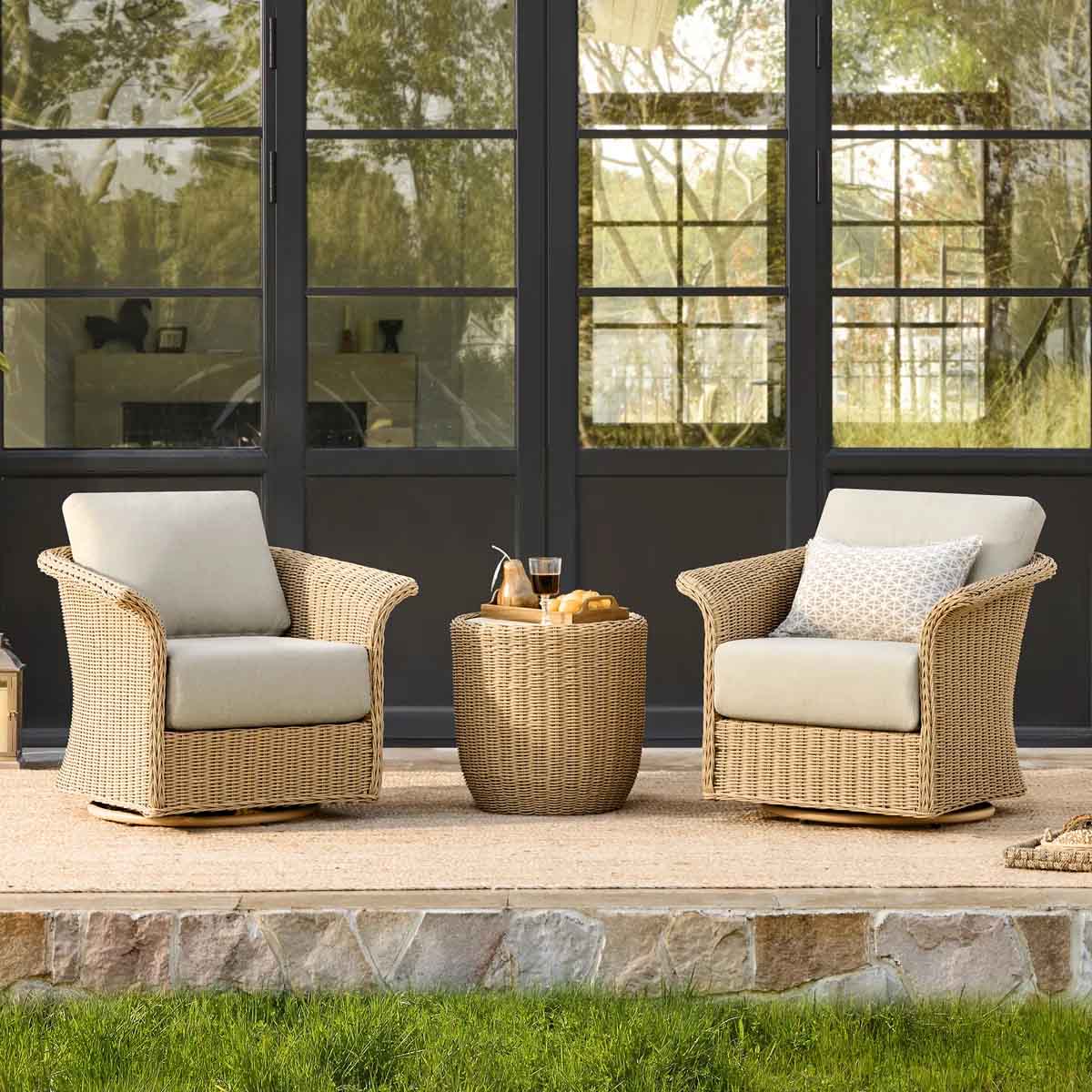 Bay Isle Home Cimone 3-Piece Outdoor Wicker Swivel Bistro Set best outdoor wicker swivel chairs