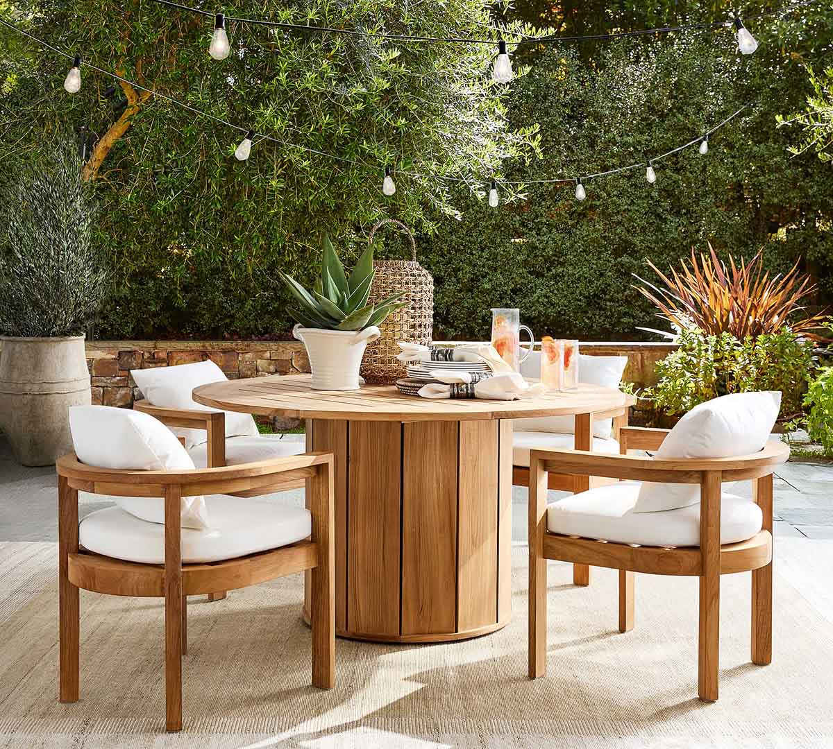 Pottery Barn Malibu Teak Curved Outdoor Dining Armchair best teak outdoor dining chairs patio