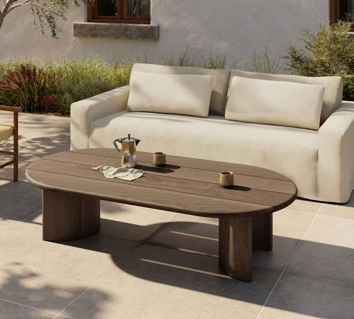 Pottery Barn Paulina Teak Oval Outdoor Coffee Table (70") best outdoor teak coffee tables