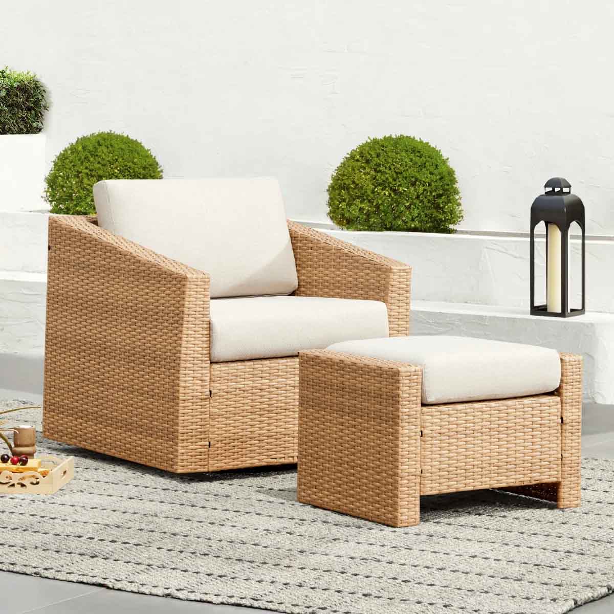 Red Barrel Studio Tiaka Outdoor Swivel Rattan Patio Chair with Ottoman best outdoor wicker swivel chairs