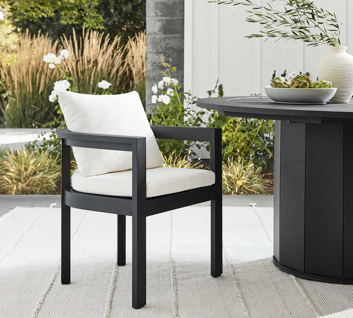 Pottery Barn Malibu Metal Rounded Outdoor Dining Armchair best metal outdoor dining chairs