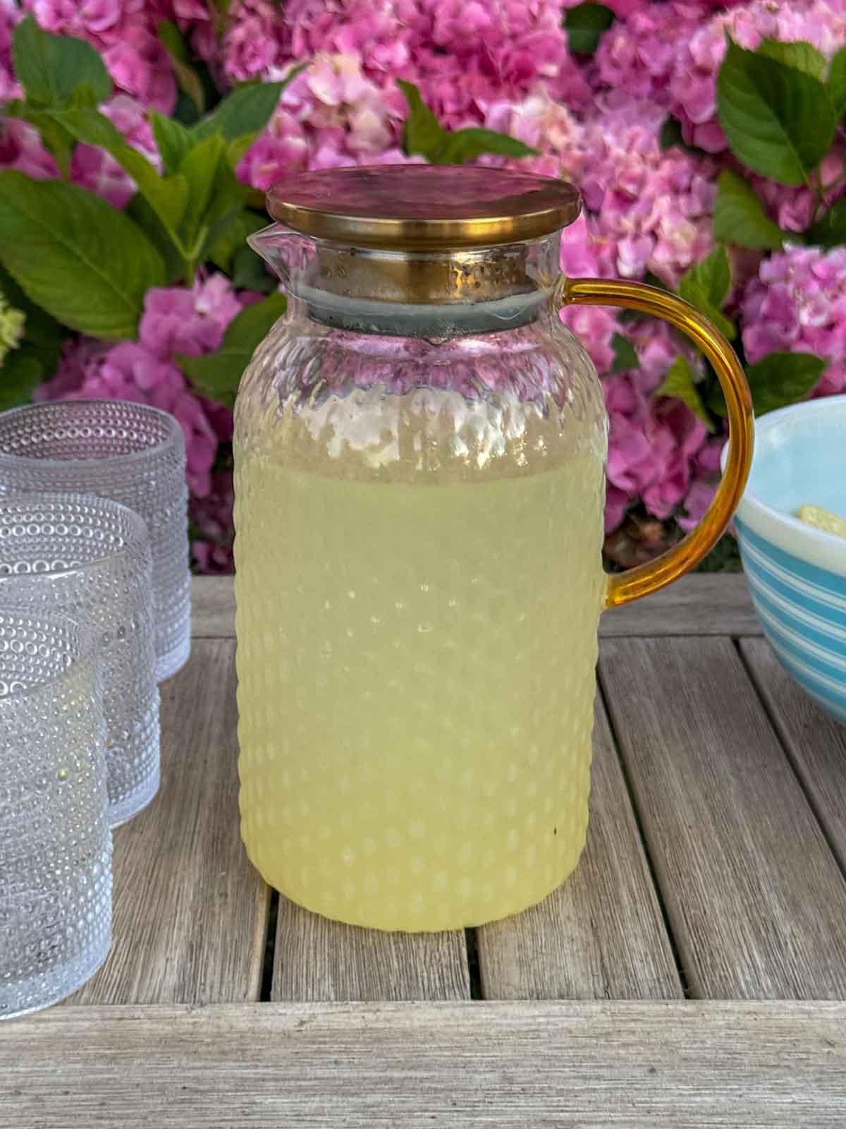 Entertaining expert, journalist and lifestyle blogger Candie Anderson of candieanderson.com shares her clear glass pitcher filled with homemade lemonade! Her Fortessa Jupiter hobnail glasses complement the pitcher beautifully.
