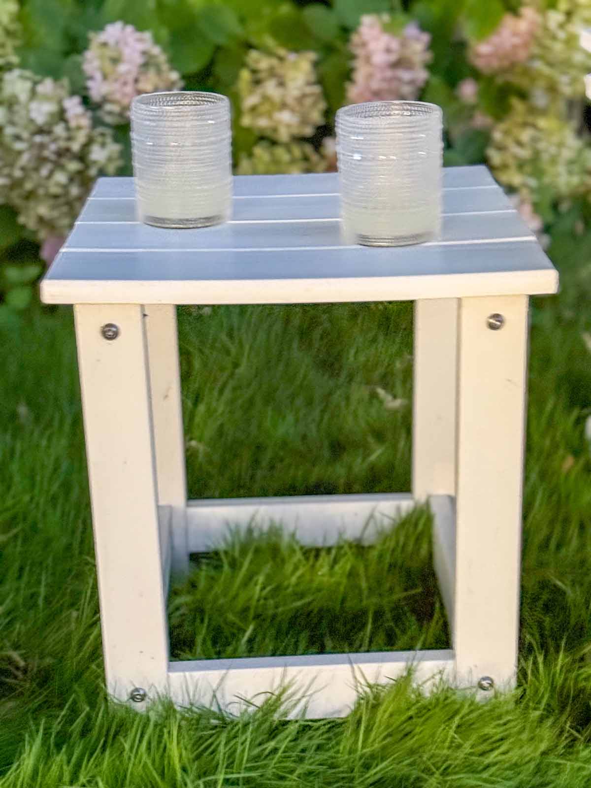 Lifestyle expert, journalist and interior design blogger Candie Anderson of candieanderson.com shares her Ebern Designs Denarrius Adirondack Outdoor Side Table.