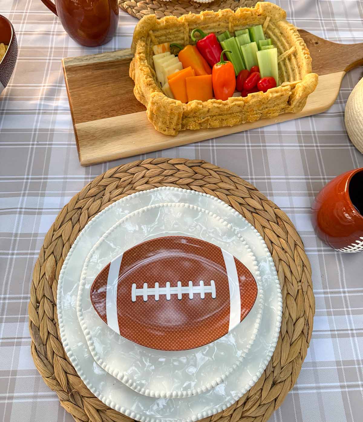 Entertaining expert, journalist and lifestyle blogger Candie Anderson of candieanderson.com shares her stadium cheese bread on her football tailgate tablescape.