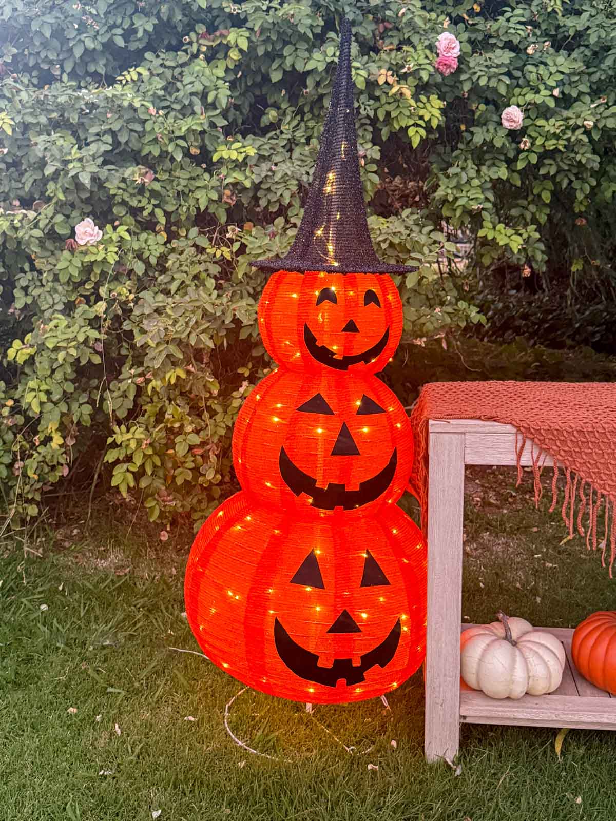 Entertaining expert, journalist and lifestyle blogger Candie Anderson of candieanderson.com shares the Birch Lane 5FT Pre-Lit Collapsible Halloween Jack-O-Lantern Pumpkin Decor that she featured next to her console table bar at her Halloween party.