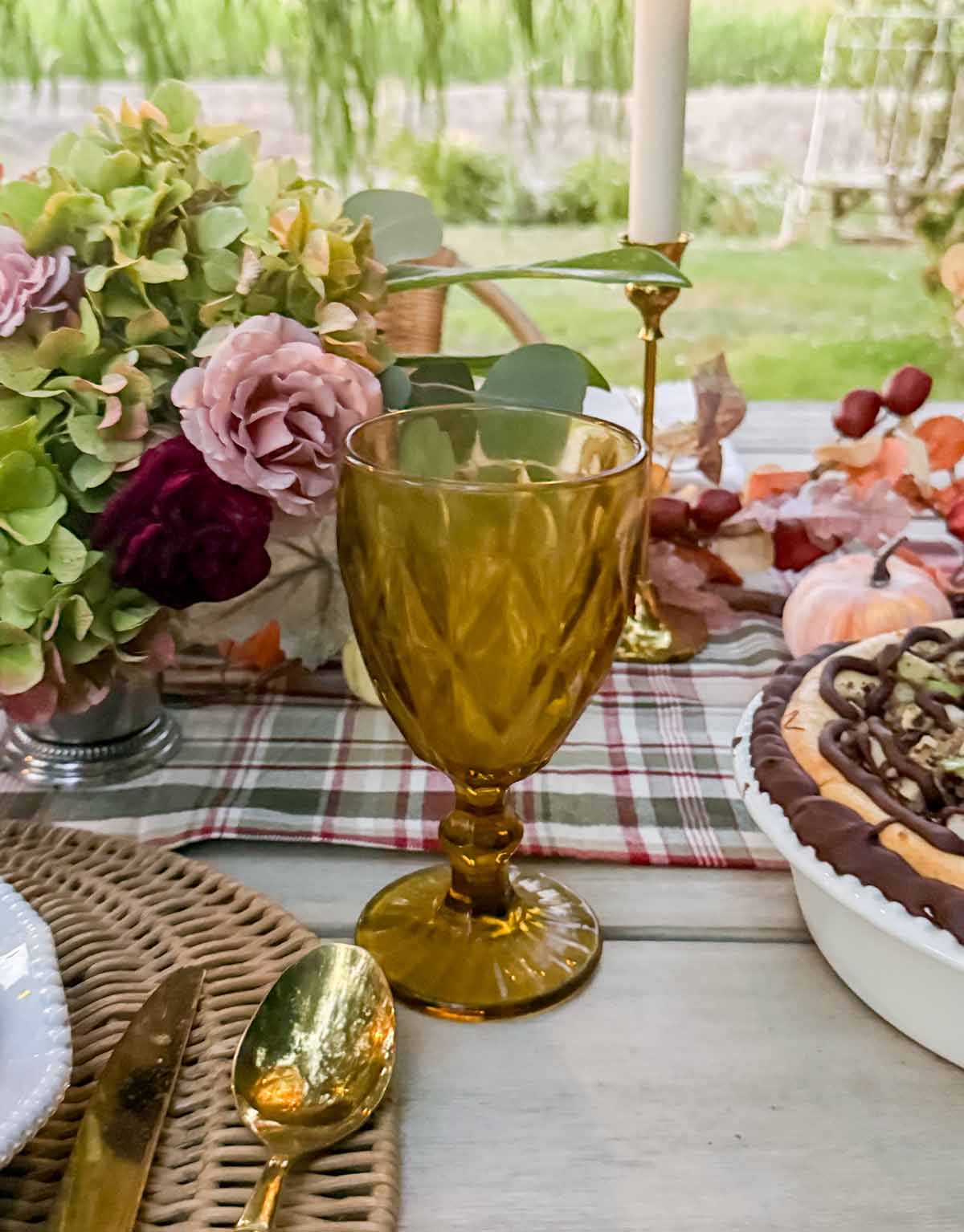 Entertaining expert, journalist and lifestyle blogger Candie Anderson of candieanderson.com shares her beautiful amber goblets, which are the perfect addition to her autumn heritage tablescape.