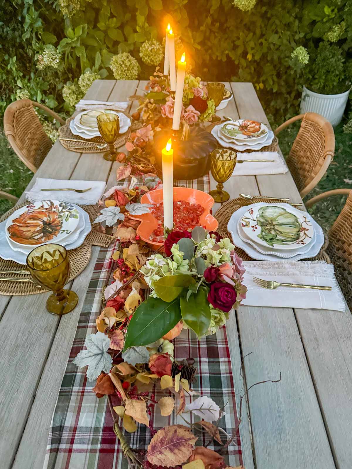 Entertaining expert, journalist and lifestyle blogger Candie Anderson of candieanderson.com shared the best plaid table runner for your fall tablescape! It's also perfect for Thanksgiving.